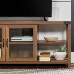Sophie Rustic Farmhouse X Frame Glass Doors TV Stand For TVs Up To 80" Rustic Oak - Saracina Home 24 Sophie Rustic Farmhouse X Frame Glass Doors TV Stand For TVs Up To 80" Rustic Oak - Saracina Home -Living Room Furniture GUEST 08461d43 c3a2 4df9 90e5 c2fd20627359